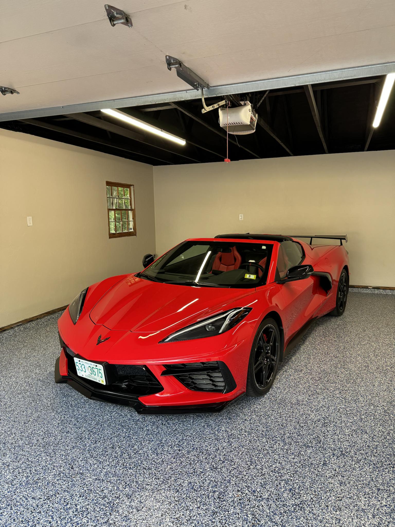 Flake garage — front angle with Corvette