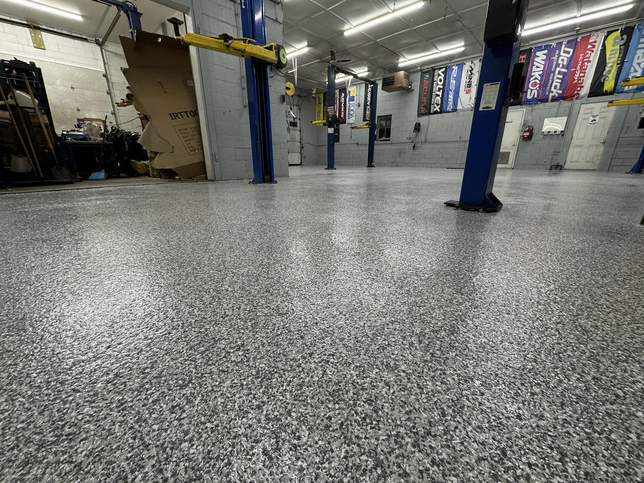 Auto shop flake floor — close-up